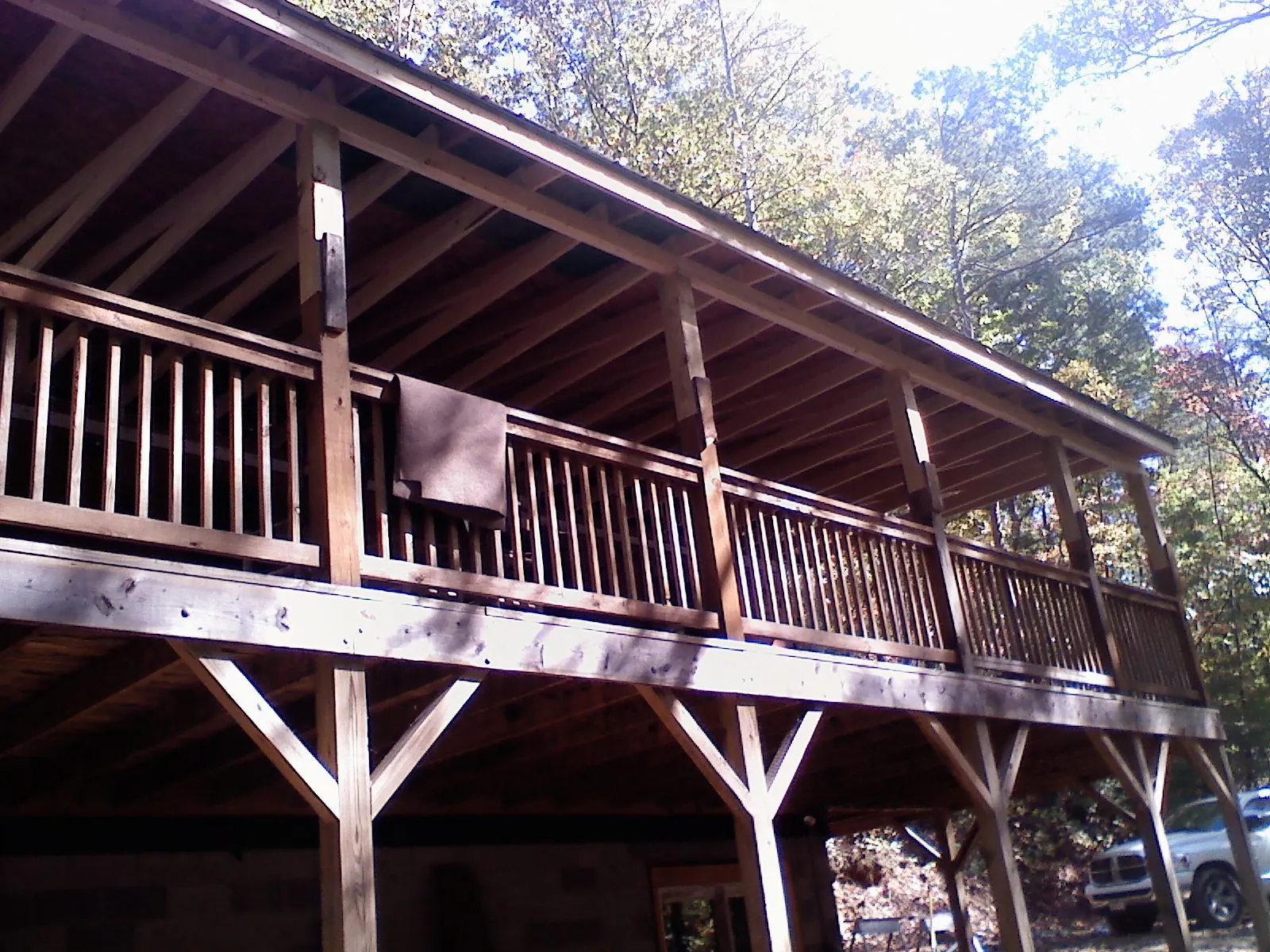 Timber framing under a new elevated porch and deck — Roof Leak Repair in Mount Shasta by Roofing Brothers